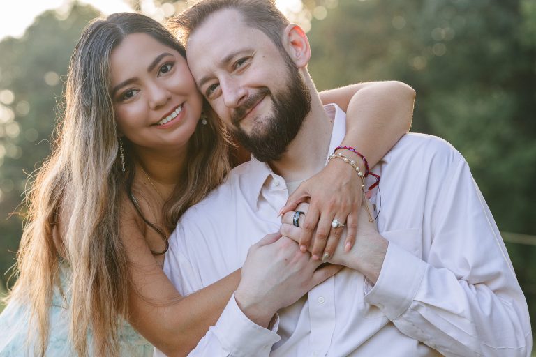 Monica and Todd embracing at their wedding